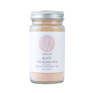 Wildcraft The Buff exfoliating face and body scrub with spearmint and rhassoul clay in a clear jar with silver lid