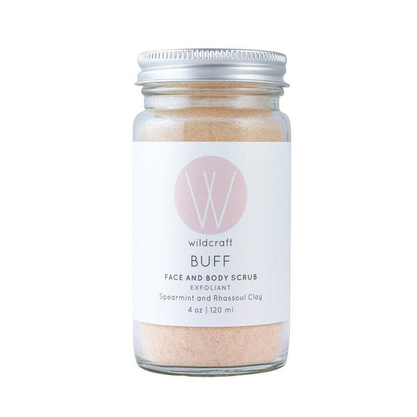 Wildcraft The Buff exfoliating face and body scrub with spearmint and rhassoul clay in a clear jar with silver lid