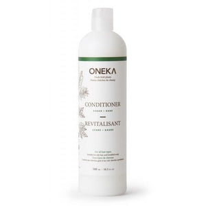 Oneka Cedar & Sage Natural Conditioner bottle with herbal botanical design, moisturizing and scalp-soothing hair care product.