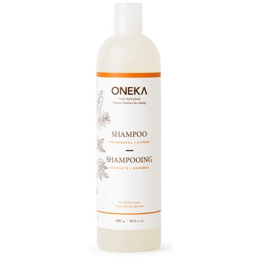 Oneka Goldenseal & Citrus Natural Shampoo bottle with clean, minimal design featuring organic plant extracts and citrus essential oils for nourishing hair care.
