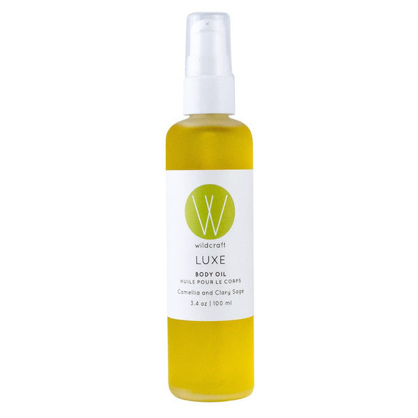 Wildcraft Luxe Body Oil in a 3.4 oz bottle with nourishing camellia seed and clary sage oils for deep hydration and glowing skin