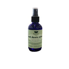 Bottle of 'Cool Down Mist' with a green label on a white background