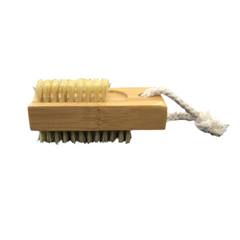 Barefoot brush with wooden handle and natural bristles on a white background