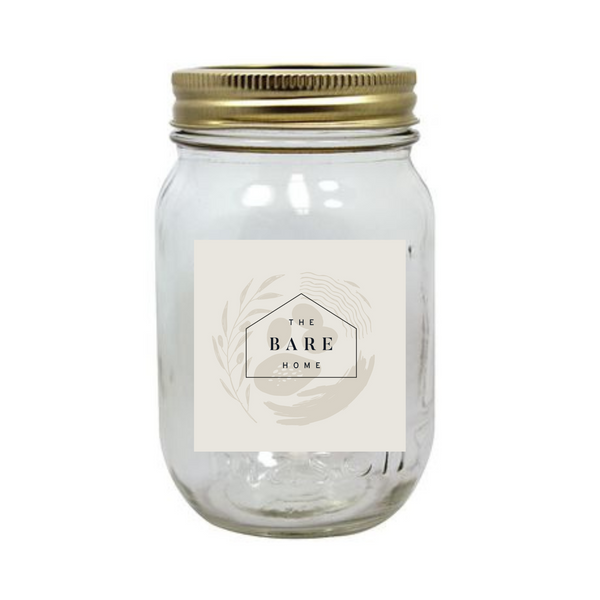 The Bare Home refill laundry soap in a clear 500ml or 1L glass mason jar with a gold lid, featuring a lavender and sage scent and eco-friendly packaging.